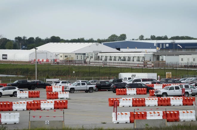 A Microsoft data center is seen near Interstate 35, Tuesday, Sept. 5, 2023, in West Des Moines. Microsoft has been amassing a cluster of data centers to power its cloud computing services for more than a decade. Its fourth and fifth data centers in the city are due to open later this year.