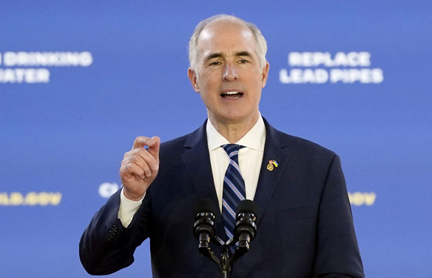 Bob Casey speaks at a microphone.