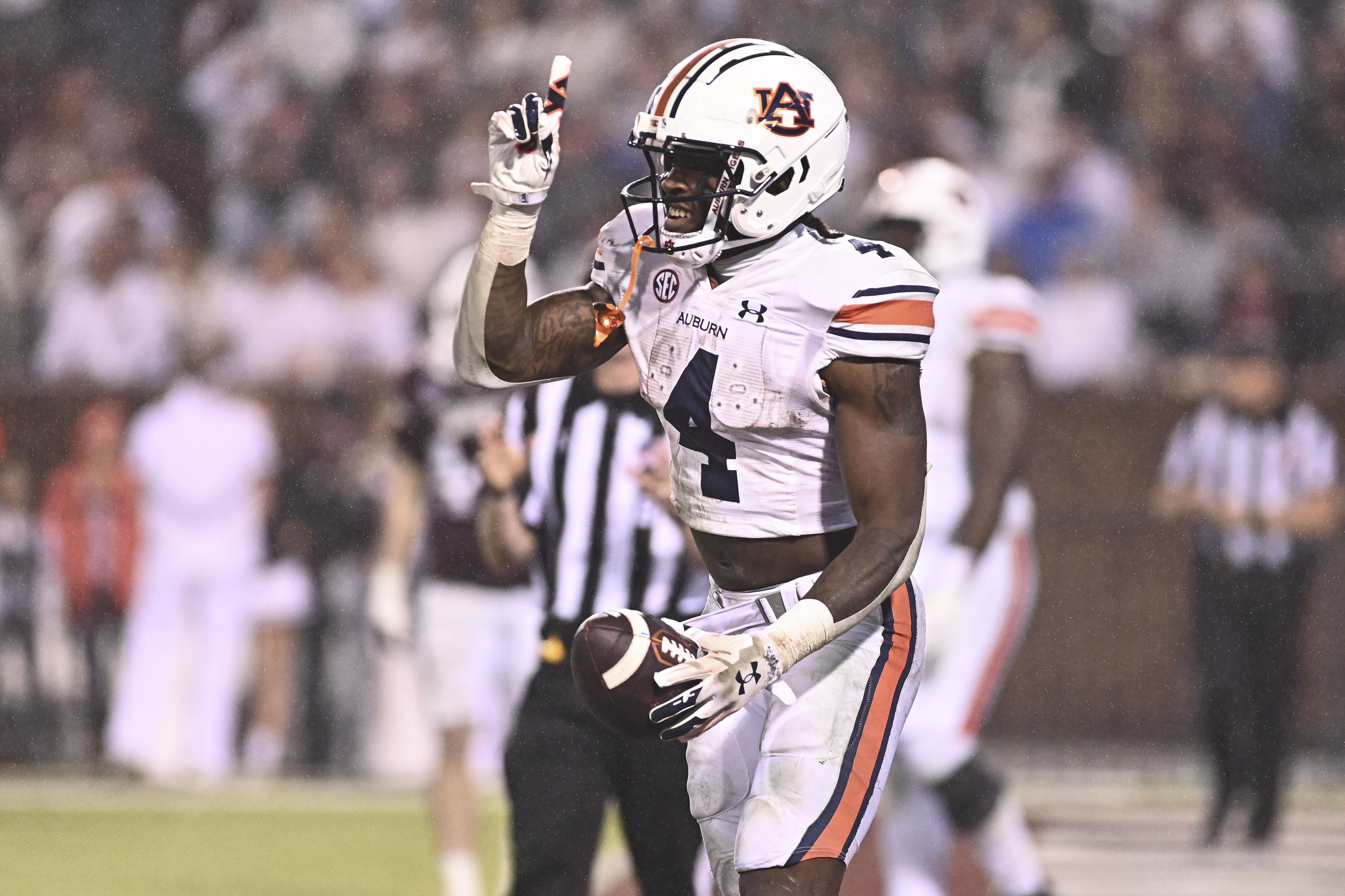 Nov 5, 2022; Starkville, Mississippi; Auburn Tigers running back Tank Bigsby (4) reacts after a touchdown against the Mississippi State Bulldogs during the fourth quarter at Davis Wade Stadium at Scott Field. Matt Bush-USA TODAY Sports